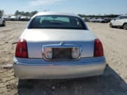 ✅ 1998 Lincoln Town Car Signature • VIN: 1LNFM82W0WY734500 • Lot: 70578805. Listed on Copart with Not provided. Free auction sales archive from the USA and detailed vehicle history report at DreamBid. Image 6.