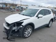 ✅ 2015 Mazda CX-5 Grand Touring • VIN: JM3KE4DY3F0448427 • Лот: 43712387. Опубликован ранее на IAAI с пробегом 131 182 миль. Бесплатный доступ к архиву аукционных продаж из США и подробный отчёт об истории автомобиля на DreamBid. Изображение 17.