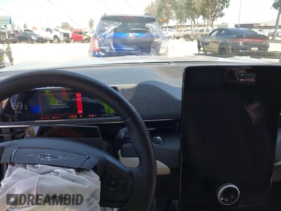 ✅ 2023 Ford Mustang Mach-E Premium • VIN: 3FMTK3R47PMA60861 • Lot: 42311615. Listed on IAAI with 27,469 mi. Free auction sales archive from the USA and detailed vehicle history report at DreamBid. Image 18.