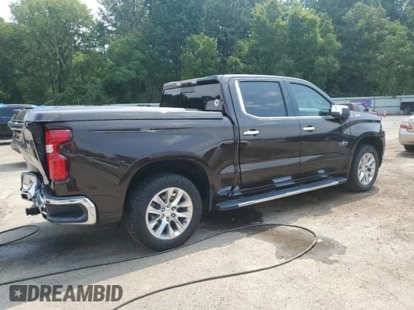 ✅ 2019 Chevrolet Silverado 1500 LTZ • VIN: 3GCUYGED4KG105573 • Лот: 69310875. Опубликован ранее на Copart с пробегом 168 228 миль. Бесплатный доступ к архиву аукционных продаж из США и подробный отчёт об истории автомобиля на DreamBid. Изображение 3.
