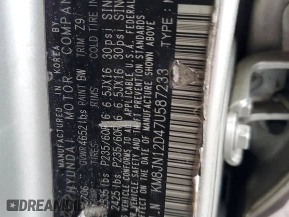 2007 Hyundai Tucson SE z VIN KM8JN12D47U587233, wystawiony jako Copart lot #84651284 z przebiegiem 187 310 mil mil oraz Szkoda całkowita • Salvage title. Historia ofert i sprzedaży dostępna na DreamBid. Obrazek 13.