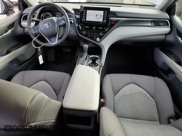 ✅ 2023 Toyota Camry Hybrid LE • VIN: 4T1C31AK2PU056580 • Лот: 82689805. Опубликован ранее на Copart с пробегом 139 138 миль. Бесплатный доступ к архиву аукционных продаж из США и подробный отчёт об истории автомобиля на DreamBid. Изображение 8.