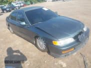 ✅ 1997 Honda Accord EX • VIN: 1HGCD5664VA069366 • Lot: 43165092. Wystawiony na IAAI z przebiegiem 153 871 mil. Bezpłatny archiwum sprzedaży aukcyjnych z USA i szczegółowy raport historii pojazdu na DreamBid. Zdjęcie 1.