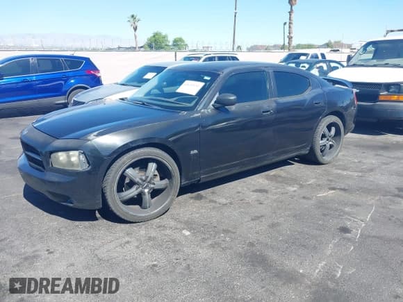 ✅ 2007 Dodge Charger • VIN: 2B3KA43G17H651344 • Lot: 42632152. Listed on IAAI with 172,451 mi. Free auction sales archive from the USA and detailed vehicle history report at DreamBid. Image 2.
