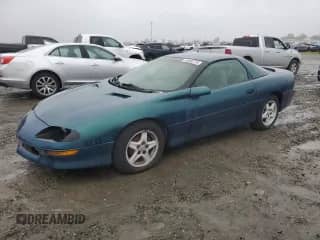 1997 Chevrolet Camaro z VIN 2G1FP22K2V2137195, wystawiony jako Copart lot #46000735 z przebiegiem 96 313 mil mil oraz Czysty tytuł • Clean title. Historia ofert i sprzedaży dostępna na DreamBid. Obrazek 1.