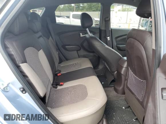 2013 Hyundai Tucson GLS with VIN KM8JU3AC2DU683302, listed as a Copart auction lot 71363164 with 42,199 mi miles and Salvage title. Bid and sale history available at DreamBid. Image 10.