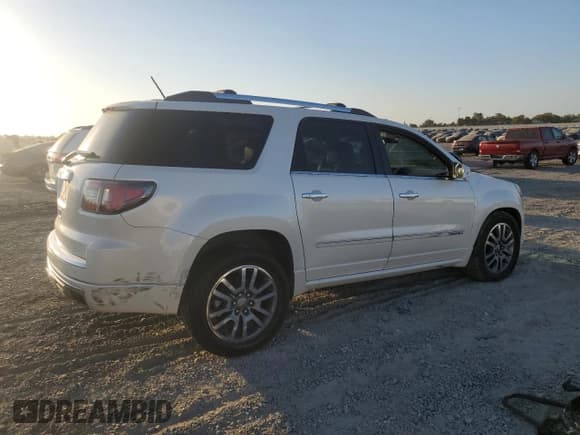 ✅ 2014 GMC Acadia Denali • VIN: 1GKKRTKD4EJ138288 • Lot: 69112845. Listed on Copart with Not provided. Free auction sales archive from the USA and detailed vehicle history report at DreamBid. Image 3.