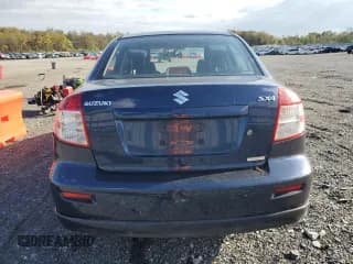 ✅ 2009 Suzuki SX4 Sport FWD • VIN: JS2YC414496202374 • Лот: 74853534. Опубликован ранее на Copart с пробегом 90 167 миль. Бесплатный доступ к архиву аукционных продаж из США и подробный отчёт об истории автомобиля на DreamBid. Изображение 6.