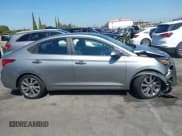 ✅ 2022 Hyundai Accent Limited • VIN: 3KPC34A65NE157519 • Lot: 43359114. Wystawiony na IAAI z przebiegiem 47 046 mil. Bezpłatny archiwum sprzedaży aukcyjnych z USA i szczegółowy raport historii pojazdu na DreamBid. Zdjęcie 13.