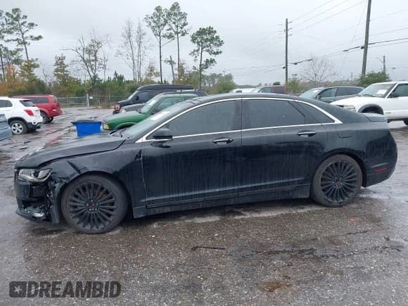 ✅ 2017 Lincoln MKZ Hybrid Reserve • VIN: 3LN6L5MU0HR602531 • Lot: 43642664. Wystawiony na IAAI z przebiegiem 247 032 mil. Bezpłatny archiwum sprzedaży aukcyjnych z USA i szczegółowy raport historii pojazdu na DreamBid. Zdjęcie 14.