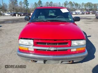 ✅ 1999 Chevrolet Blazer LS • VIN: 1GNDT13W2X2163804 • Lot: 41527624. Wystawiony na IAAI z przebiegiem 185 151 mil. Bezpłatny archiwum sprzedaży aukcyjnych z USA i szczegółowy raport historii pojazdu na DreamBid. Zdjęcie 6.