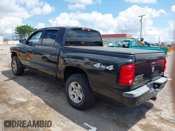 2007 Dodge Dakota SLT with VIN 1D7HW48K17S118416, listed as a IAAI auction lot 42209225 with 133,678 mi miles and . Bid and sale history available at DreamBid. Image 3.
