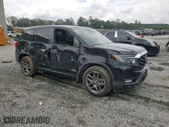 ✅ 2022 Honda Passport EX-L • VIN: 5FNYF8H56NB018477 • Lot: 68481775. Listed on Copart with 67,175 mi. Free auction sales archive from the USA and detailed vehicle history report at DreamBid. Image 14.