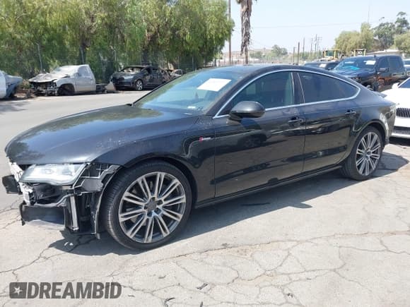 ✅ 2013 Audi A7 Premium Plus • VIN: WAUYGAFC4DN151483 • Лот: 42261777. Опубликован ранее на IAAI с пробегом 122 497 миль. Бесплатный доступ к архиву аукционных продаж из США и подробный отчёт об истории автомобиля на DreamBid. Изображение 2.