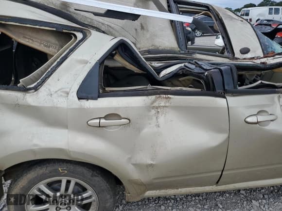 ✅ 2010 Mercury Mariner Premier • VIN: 4M2CN8HG6AKJ05091 • Lot: 68437505. Listed on Copart with Not provided. Free auction sales archive from the USA and detailed vehicle history report at DreamBid. Image 11.