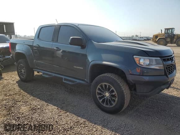 2018 Chevrolet Colorado 4WD ZR2 with VIN 1GCGTEEN7J1206189, listed as a Copart auction lot 71172835 with 136,672 mi miles and Salvage title. Bid and sale history available at DreamBid. Image 4.