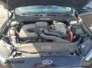 ✅ 2013 Ford Fusion SE Hybrid • VIN: 3FA6P0LU0DR153929 • Лот: 91201585. Опубликован ранее на Copart с пробегом 120 343 миль. Бесплатный доступ к архиву аукционных продаж из США и подробный отчёт об истории автомобиля на DreamBid. Изображение 11.