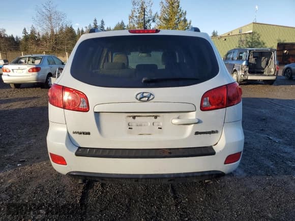 ✅ 2009 Hyundai Santa Fe GLS • VIN: 5NMSG13D09H330355 • Lot: 86271174. Listed on Copart with 150,269 mi. Free auction sales archive from the USA and detailed vehicle history report at DreamBid. Image 6.