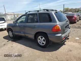 2001 Hyundai Santa Fe GLS с VIN KM8SC83D41U069325, выставлен на аукционе Copart как лот 54377815 с пробегом 51 574 миль миль и Чистый • Clean title. История ставок и продаж доступна на DreamBid. Изображение 2.