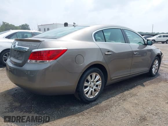 ✅ 2012 Buick LaCrosse • VIN: 1G4GA5ER4CF242450 • Lot: 42897859. Listed on IAAI with 178,899 mi. Free auction sales archive from the USA and detailed vehicle history report at DreamBid. Image 4.