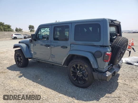 ✅ 2024 Jeep Wrangler Sahara • VIN: 1C4RJXP62RW228115 • Lot: 69132165. Listed on Copart with 6,032 mi. Free auction sales archive from the USA and detailed vehicle history report at DreamBid. Image 2.