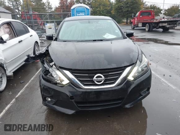 ✅ 2016 Nissan Altima SL • VIN: 1N4BL3AP2GC291189 • Lot: 43572471. Listed on IAAI with 104,412 mi. Free auction sales archive from the USA and detailed vehicle history report at DreamBid. Image 12.