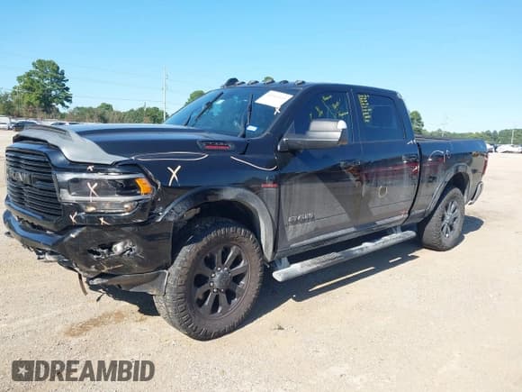 ✅ 2022 Ram 2500 Laramie • VIN: 3C6UR5FL5NG391825 • Lot: 43163025. Listed on IAAI with 73,742 mi. Free auction sales archive from the USA and detailed vehicle history report at DreamBid. Image 2.