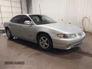 ✅ 1999 Pontiac Grand Prix GTP • VIN: 1G2WR5212XF242240 • Lot: 41933297. Listed on IAAI with 248,118 mi. Free auction sales archive from the USA and detailed vehicle history report at DreamBid. Image 1.