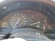 ✅ 1999 Saturn SC • VIN: 1G8ZN1283XZ283513 • Лот: 41760055. Опубликован ранее на Copart с пробегом Не указан. Бесплатный доступ к архиву аукционных продаж из США и подробный отчёт об истории автомобиля на DreamBid. Изображение 9.