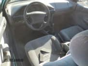 ✅ 1995 Ford Escort • VIN: 3FASP11J4SR216881 • Lot: 82966474. Listed on Copart with 172,397 mi. Free auction sales archive from the USA and detailed vehicle history report at DreamBid. Image 8.