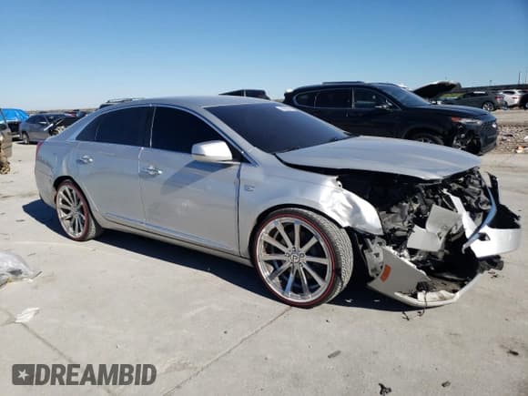 ✅ 2018 Cadillac XTS • VIN: 2G61L5S34J9134469 • Лот: 46660945. Опубликован ранее на Copart с пробегом 122 011 миль. Бесплатный доступ к архиву аукционных продаж из США и подробный отчёт об истории автомобиля на DreamBid. Изображение 4.