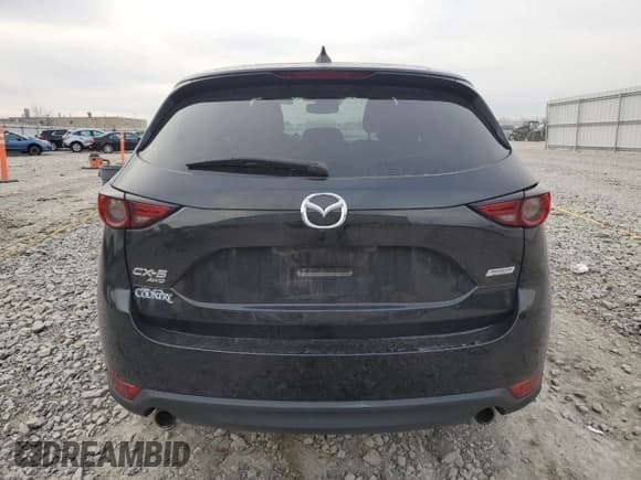✅ 2018 Mazda CX-5 Grand Touring • VIN: JM3KFBDMXJ0371482 • Lot: 91662375. Listed on Copart with 74,067 mi. Free auction sales archive from the USA and detailed vehicle history report at DreamBid. Image 6.