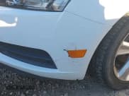 ✅ 2014 Chevrolet Cruze 2LT • VIN: 1G1PE5SB0E7418528 • Lot: 43525230. Listed on IAAI with 89,999 mi. Free auction sales archive from the USA and detailed vehicle history report at DreamBid. Image 6.