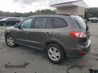✅ 2012 Hyundai Santa Fe GLS • VIN: 5XYZGDAB8CG155100 • Lot: 75912414. Listed on Copart with 139,580 mi. Free auction sales archive from the USA and detailed vehicle history report at DreamBid. Image 2.