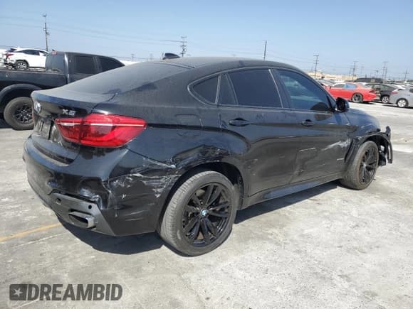 ✅ 2019 BMW X6 xDrive50i • VIN: 5UXKU6C52KLP60647 • Lot: 59463424. Listed on Copart with 41,351 mi. Free auction sales archive from the USA and detailed vehicle history report at DreamBid. Image 3.