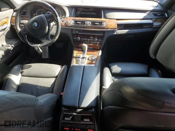 ✅ 2014 BMW 7 Series 740i • VIN: WBAYA6C51ED144180 • Lot: 91565665. Listed on Copart with 94,220 mi. Free auction sales archive from the USA and detailed vehicle history report at DreamBid. Image 8.