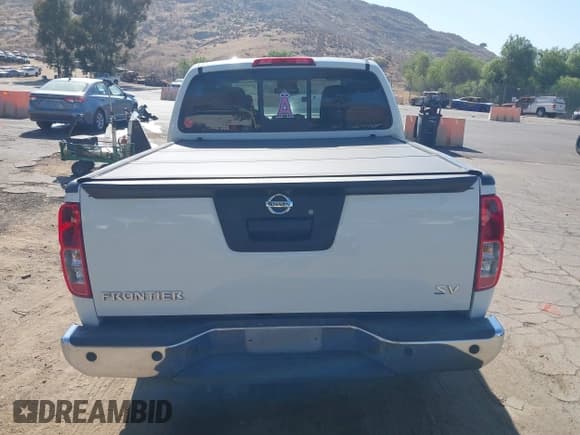 ✅ 2021 Nissan Frontier SV • VIN: 1N6ED0EA2MN704430 • Lot: 42878020. Listed on IAAI with 67,962 mi. Free auction sales archive from the USA and detailed vehicle history report at DreamBid. Image 16.