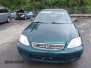 ✅ 1999 Honda Civic VP • VIN: 2HGEJ6614XH511921 • Lot: 42377142. Listed on IAAI with 109,156 mi. Free auction sales archive from the USA and detailed vehicle history report at DreamBid. Image 12.