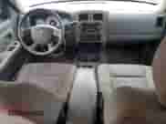 2006 Dodge Dakota SLT z VIN 1D7HE42N16S702822, wystawiony jako Copart lot #44034175 z przebiegiem 141 509 mil mil oraz Szkoda całkowita • Salvage title. Historia ofert i sprzedaży dostępna na DreamBid. Obrazek 8.