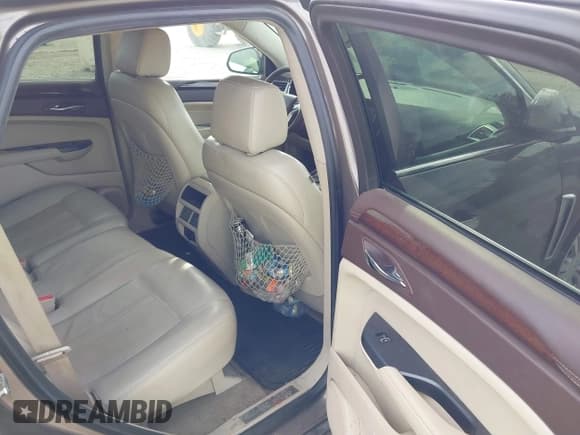 ✅ 2014 Cadillac SRX Luxury Collection • VIN: 3GYFNEE32ES587548 • Lot: 43298731. Listed on IAAI with 126,400 mi. Free auction sales archive from the USA and detailed vehicle history report at DreamBid. Image 8.