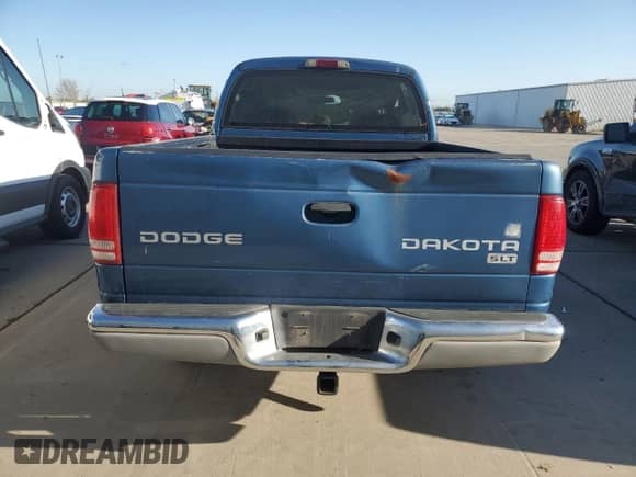 2004 Dodge Dakota SLT z VIN 1D7HG48K14S774396, wystawiony jako Copart lot #51699175 z przebiegiem 206 799 mil mil oraz Czysty tytuł • Clean title. Historia ofert i sprzedaży dostępna na DreamBid. Obrazek 6.