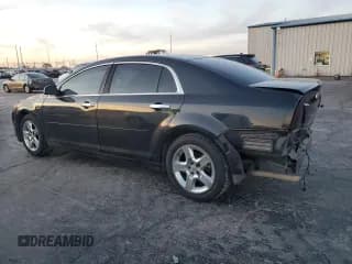 ✅ 2012 Chevrolet Malibu 1FL • VIN: 1G1ZA5EU2CF293259 • Lot: 80011104. Listed on Copart with 138,790 mi. Free auction sales archive from the USA and detailed vehicle history report at DreamBid. Image 2.