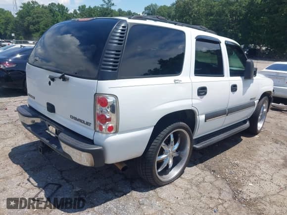✅ 2003 Chevrolet Tahoe LS • VIN: 1GNEC13Z73R176239 • Lot: 42660496. Listed on IAAI with 290,107 mi. Free auction sales archive from the USA and detailed vehicle history report at DreamBid. Image 4.