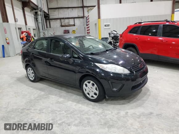 ✅ 2013 Ford Fiesta S • VIN: 3FADP4AJ5DM107100 • Lot: 85511955. Wystawiony na Copart z przebiegiem 194 329 mil. Bezpłatny archiwum sprzedaży aukcyjnych z USA i szczegółowy raport historii pojazdu na DreamBid. Zdjęcie 4.