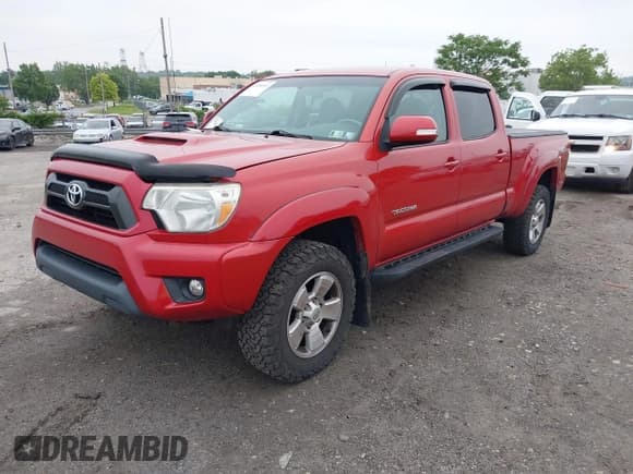 ✅ 2014 Toyota Tacoma • VIN: 3TMMU4FN2EM070457 • Lot: 42498840. Listed on IAAI with 129,060 mi. Free auction sales archive from the USA and detailed vehicle history report at DreamBid. Image 2.