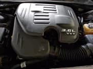 ✅ 2014 Dodge Challenger SXT Plus • VIN: 2C3CDYAGXEH171972 • Lot: 83479264. Wystawiony na Copart z przebiegiem 151 405 mil. Bezpłatny archiwum sprzedaży aukcyjnych z USA i szczegółowy raport historii pojazdu na DreamBid. Zdjęcie 13.