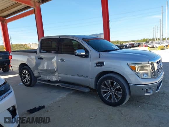 ✅ 2017 Nissan Titan Platinum Reserve • VIN: 1N6AA1E68HN542396 • Lot: 43688877. Listed on IAAI with 124,644 mi. Free auction sales archive from the USA and detailed vehicle history report at DreamBid. Image 13.