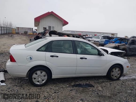 ✅ 2007 Ford Focus S • VIN: 1FAHP34N57W355068 • Lot: 43735746. Listed on IAAI with 126,471 mi. Free auction sales archive from the USA and detailed vehicle history report at DreamBid. Image 13.