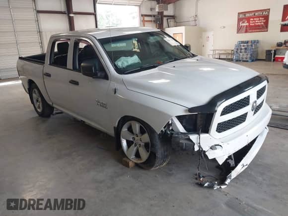 2014 Ram 1500 Tradesman z VIN 1C6RR6KG3ES480709, wystawiony jako IAAI lot #42817489 z przebiegiem 170 425 mil mil oraz . Historia ofert i sprzedaży dostępna na DreamBid. Obrazek 1.