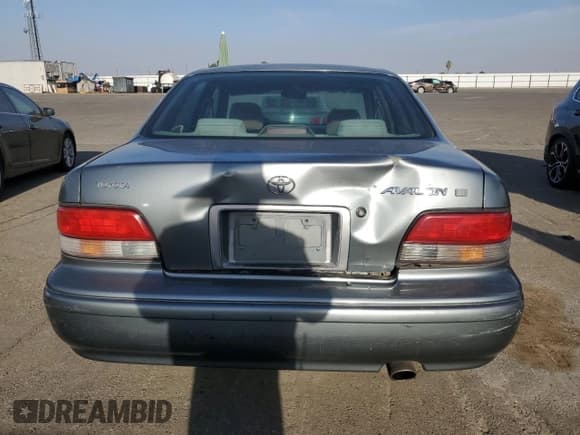 ✅ 1997 Toyota Avalon XL • VIN: 4T1BF12B4VU185824 • Lot: 81087855. Listed on Copart with 137,105 mi. Free auction sales archive from the USA and detailed vehicle history report at DreamBid. Image 6.